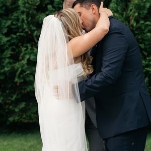 Beautiful long ivory veil with satin/silk lining